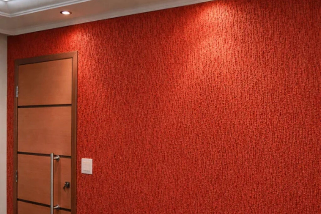 Detalhe técnico de aplicação de grafiato em parede de alto padrão no bairro do Jardim Avelino.