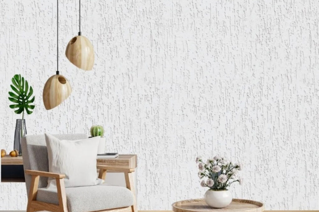 Parede residencial de luxo em São Caetano do Sul com aplicação de textura grafiato cinza e proteção de resina acrílica da Big Texturas.