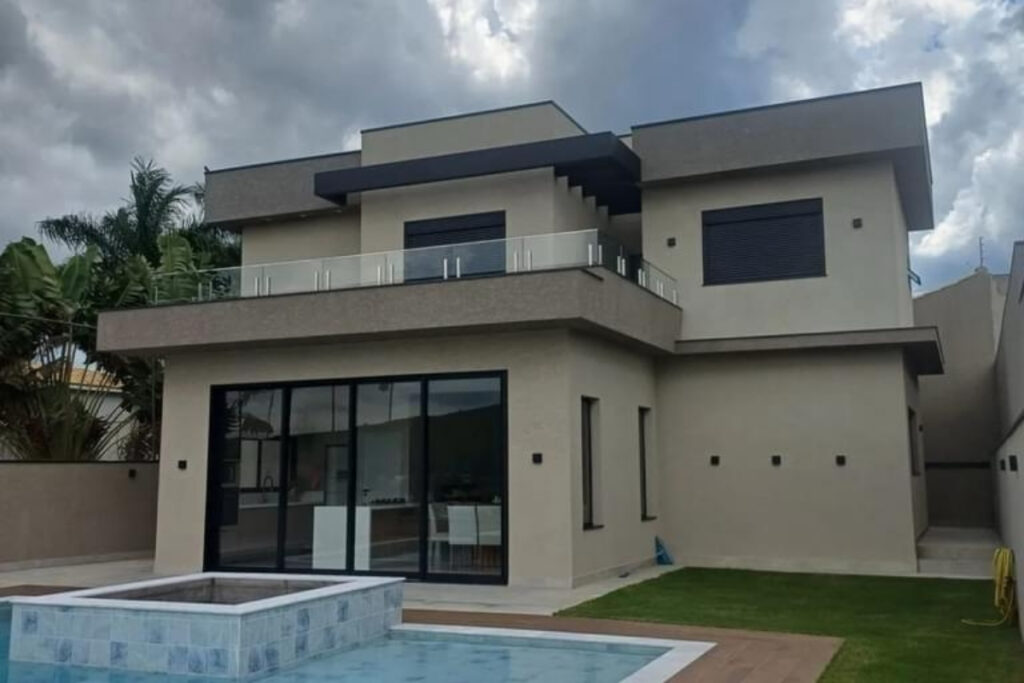 Acabamento moderno de textura de parede design em prédio residencial na Vila Ema com proteção da Big Texturas.