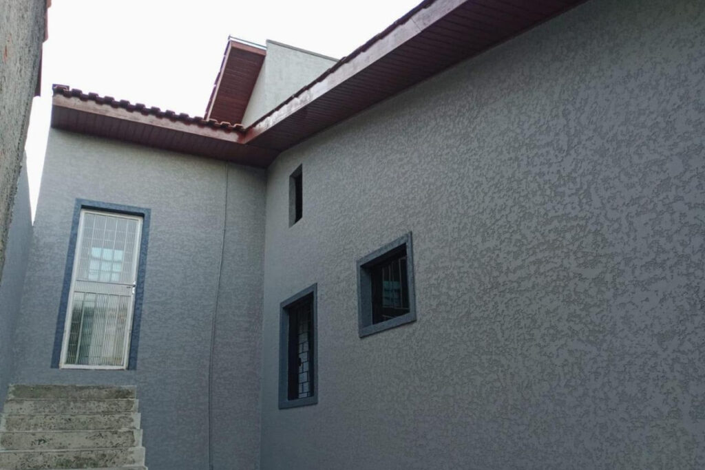 Textura aplicada em uma poarede de uma cas na mooca